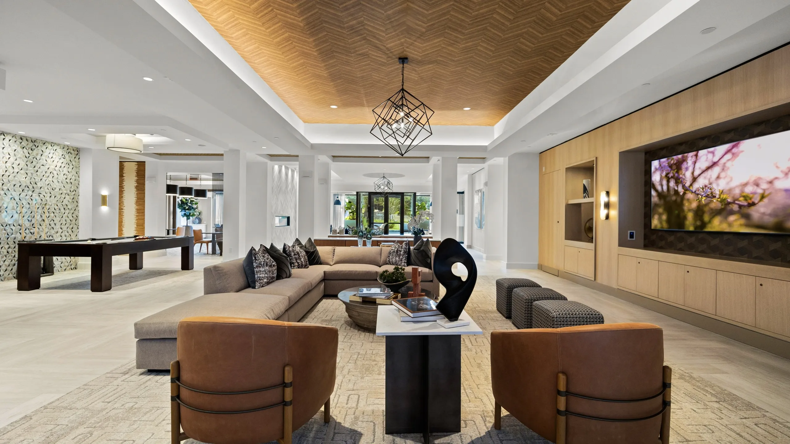 resident lounge with sectional sofa and chairs, TV and pool table