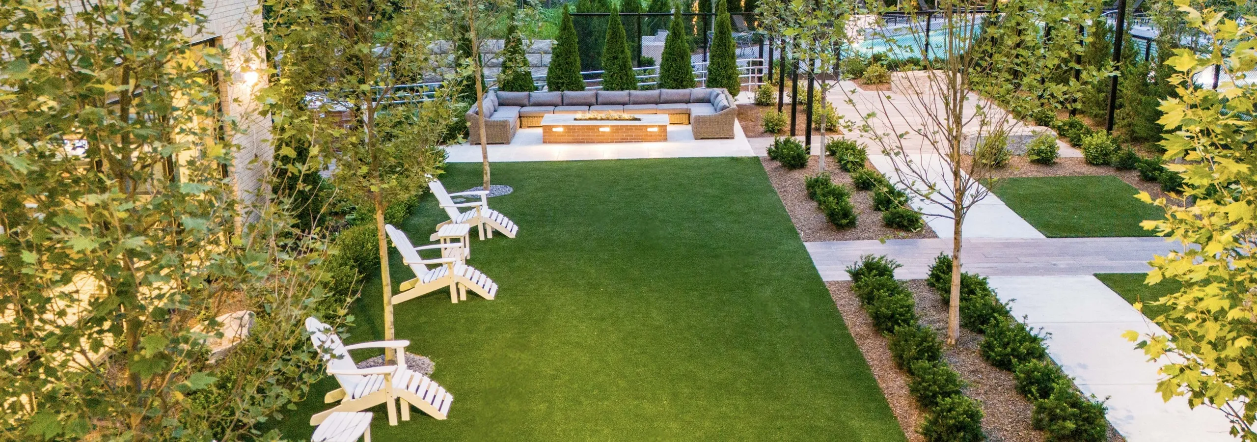 overhead view of great lawn with fireplace and lounge seating