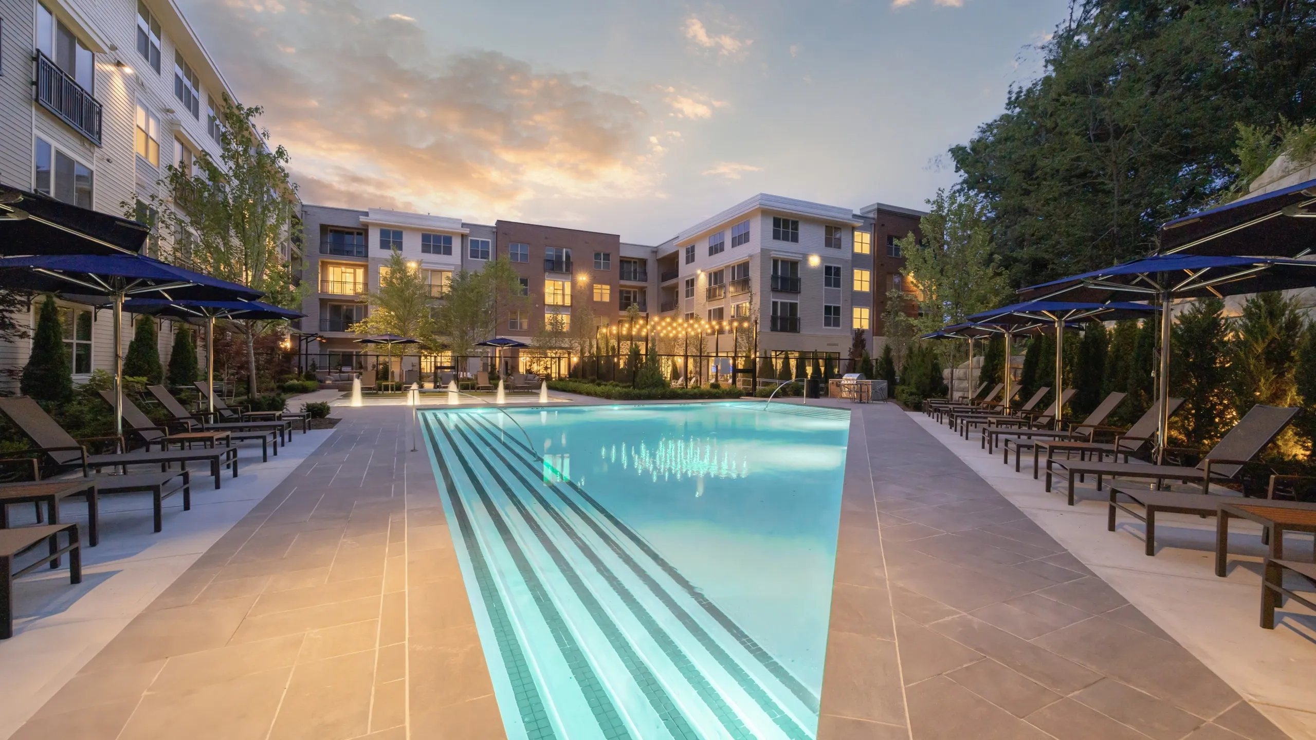 Resort style pool with both sunny and shaded seating options
