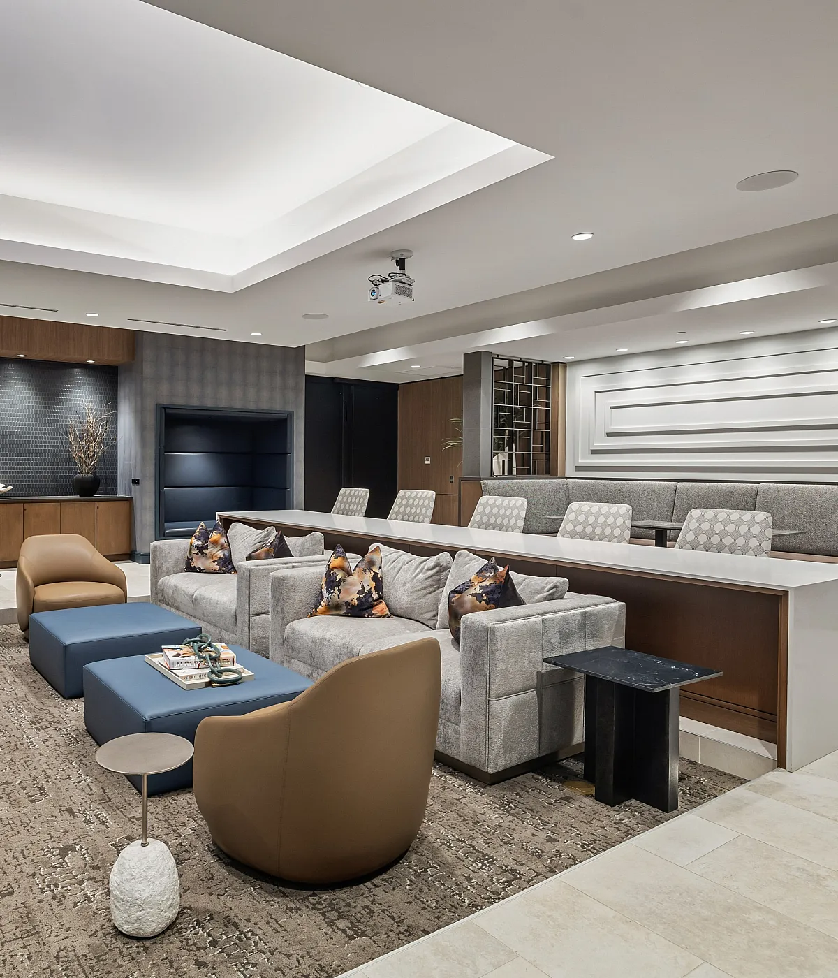 media lounge with cozy seating and hd projector
