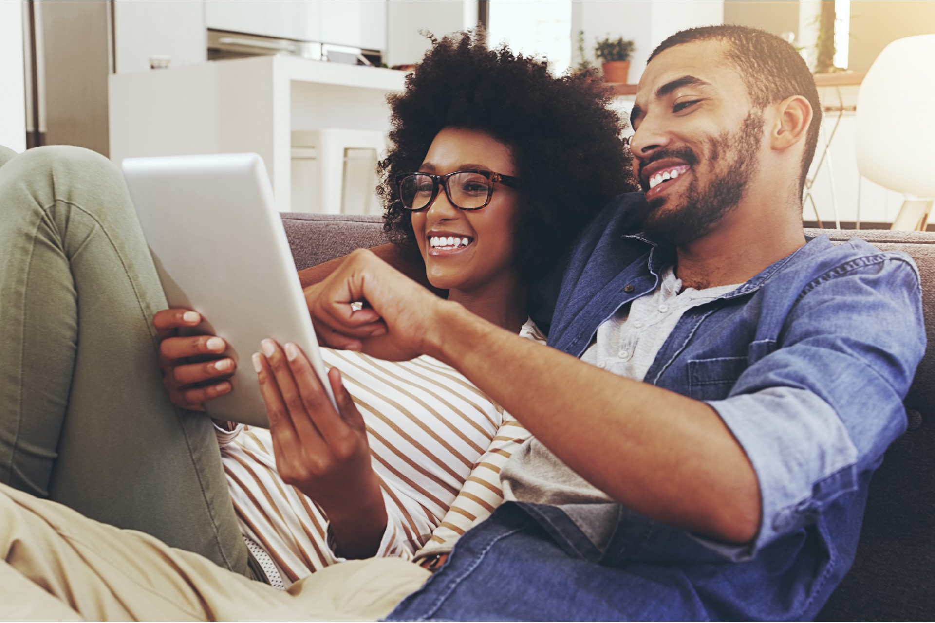 Couple relaxing on sofa