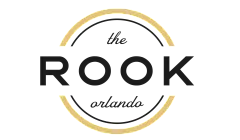Elegant logo design featuring 'The Rook Orlando' with a sophisticated circular motif and gold accents.