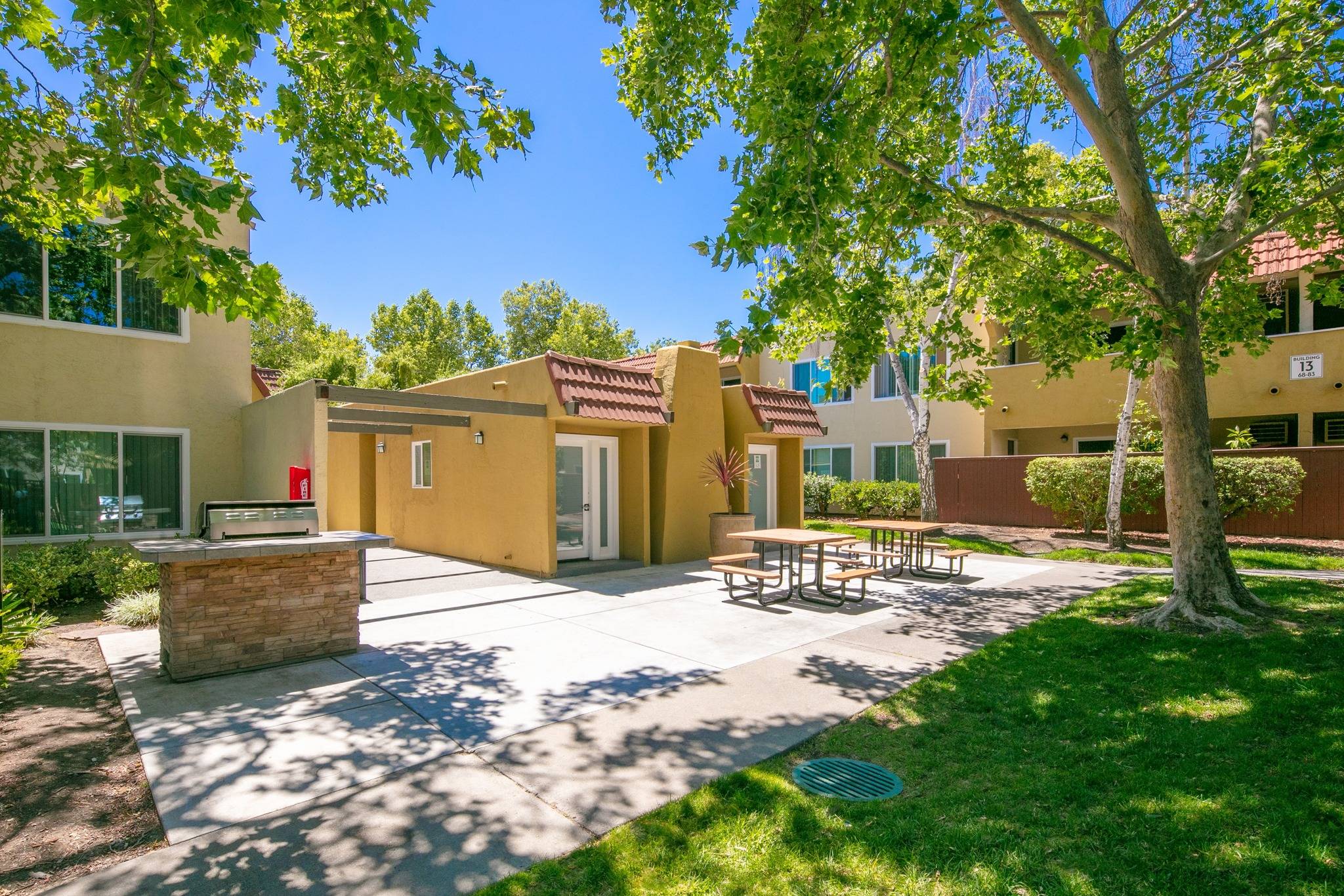 San Jose Apartments Community Area Gas Grill Picnic Lush Landscaping Trees