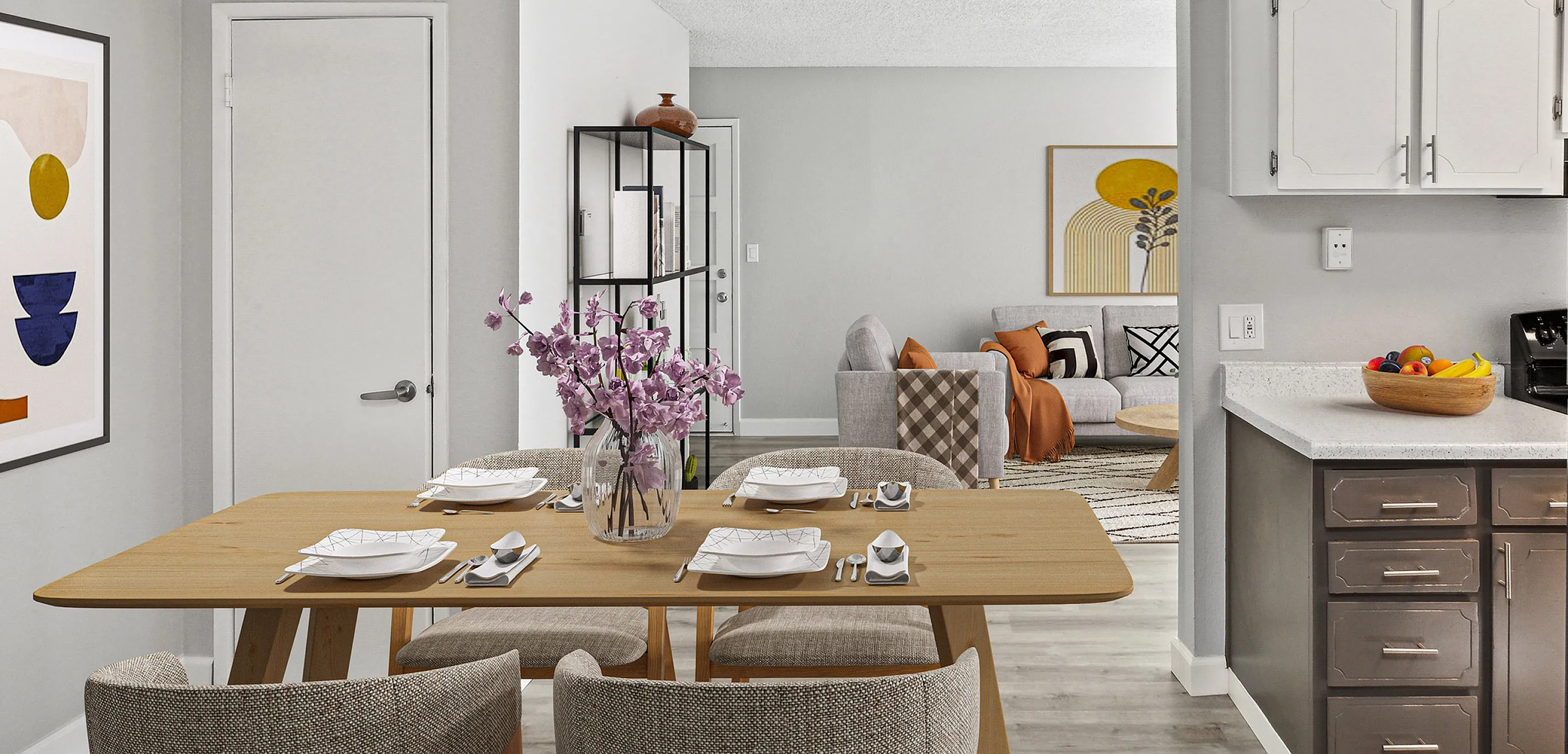 Bright dining area leading to a cozy living space with modern decor.