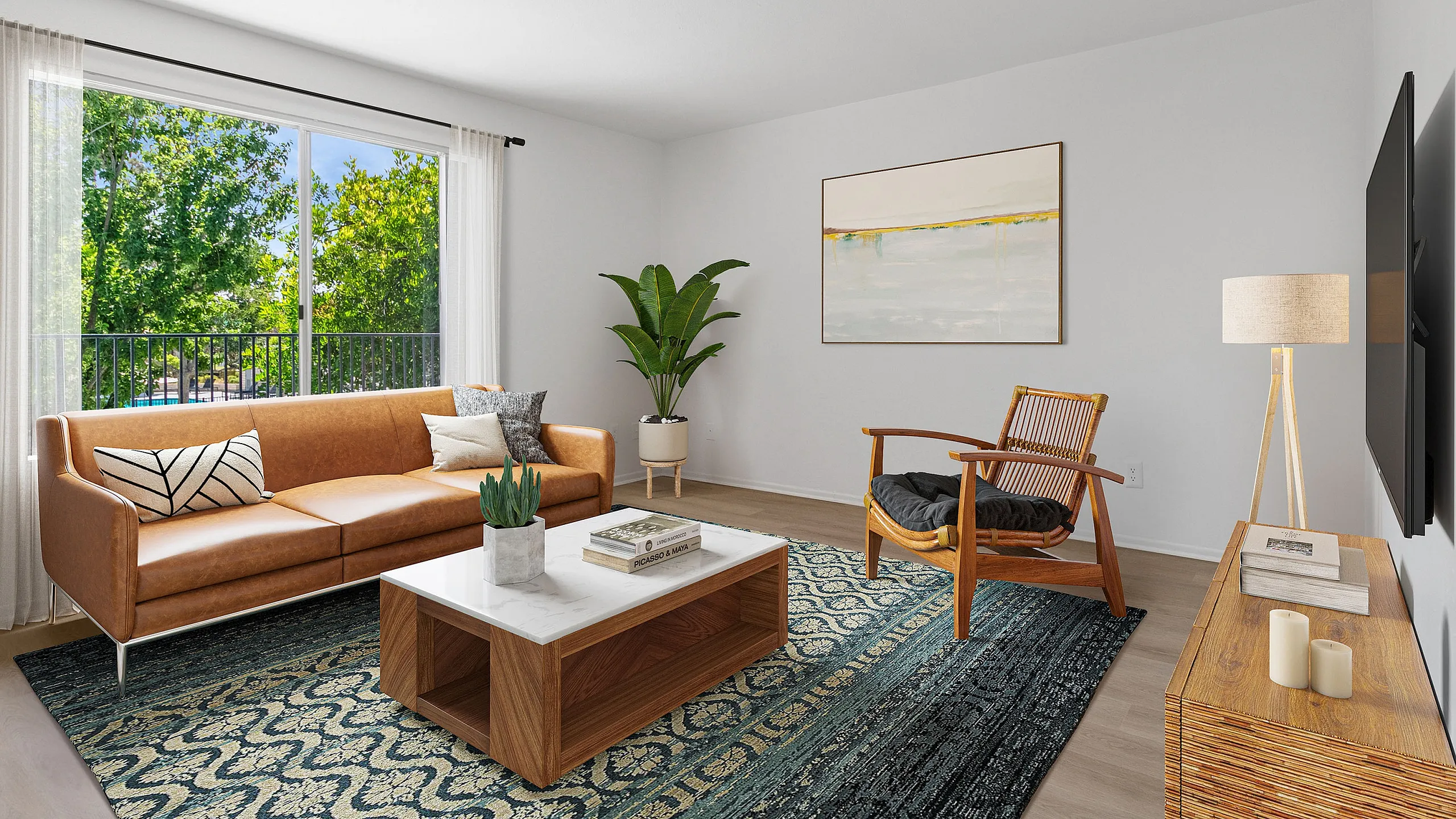 Bright and inviting living room featuring a stylish leather sofa, modern wooden coffee table, and large window with a scenic view.