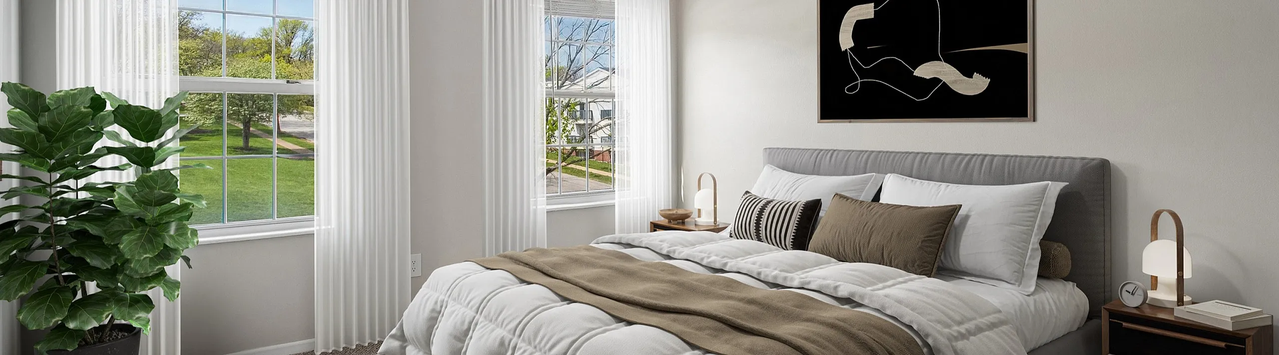 Bright and airy bedroom with large windows, modern ceiling fan, stylish decor, and a comfortable bed.