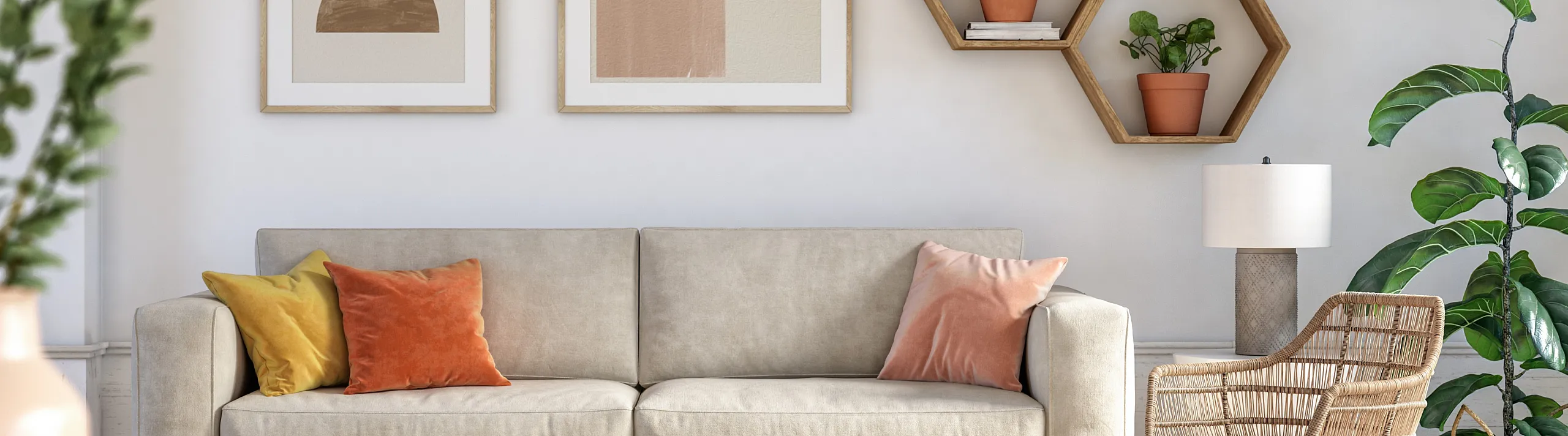 Modern living room with a cozy beige sofa, colorful cushions, stylish art, and lush greenery for a serene ambiance.