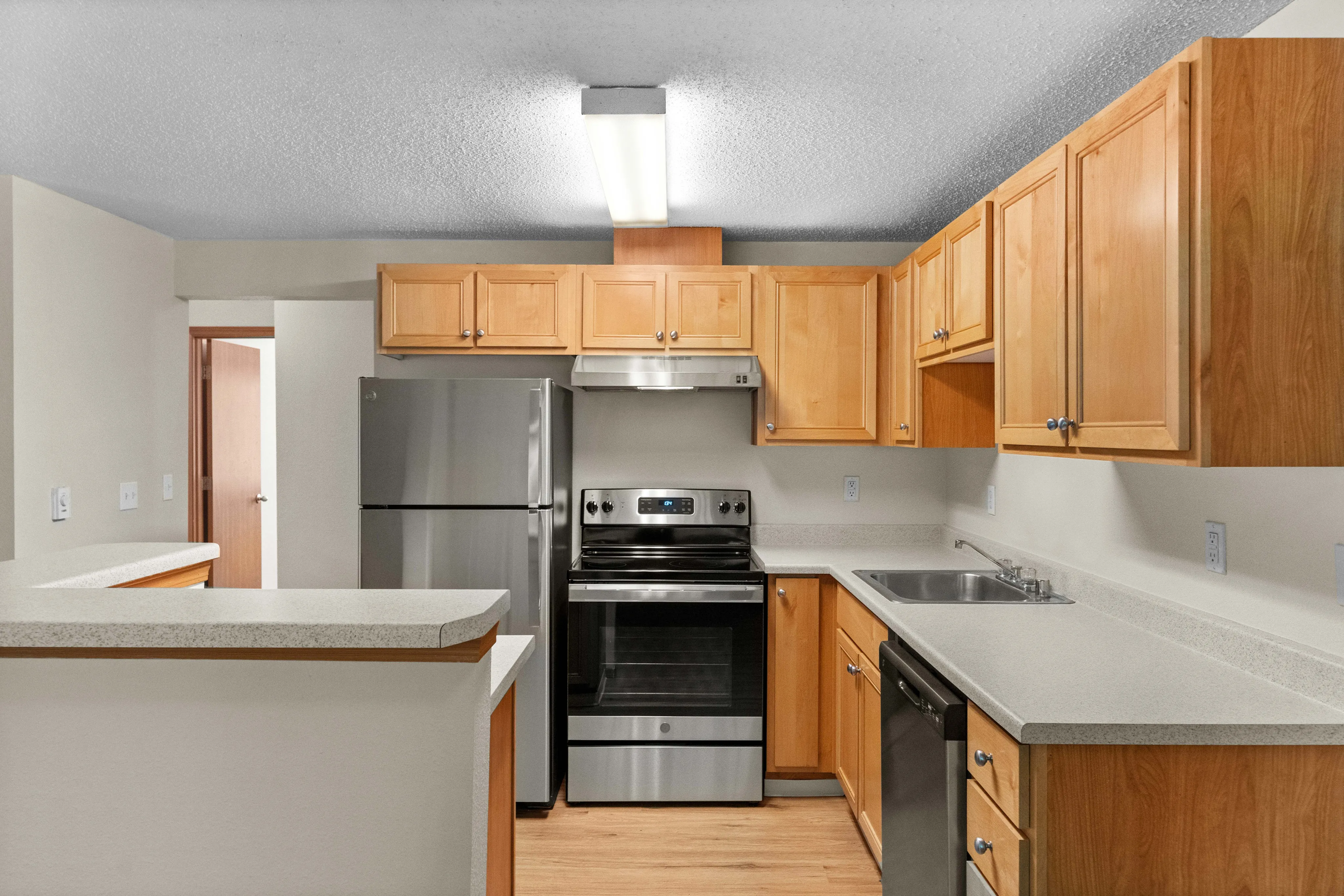 Kitchen with Island l Apartments for Rent in Tacoma, WA l Cedar Court Apartments