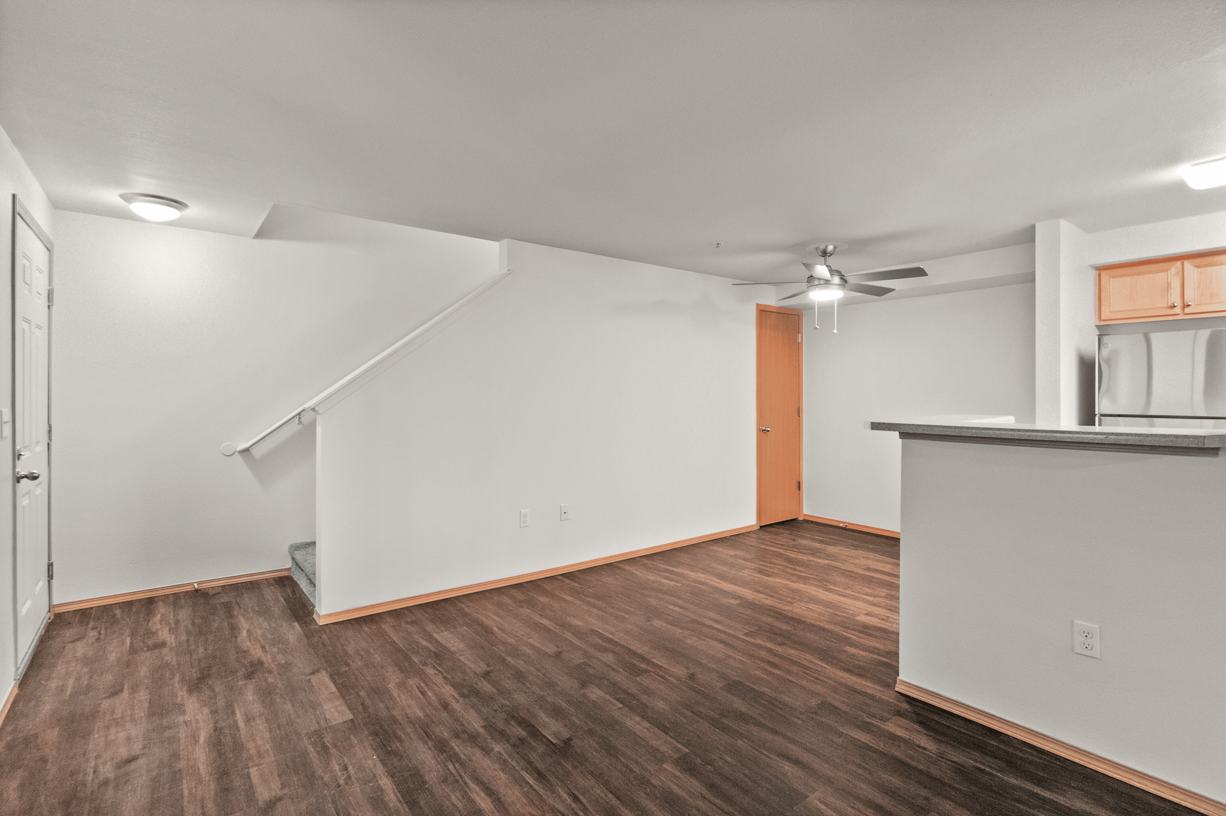 2x2 Townhome Living Room + Dining Room l Apartments for Rent in Tacoma, WA l Fircrest Gardens Apartments