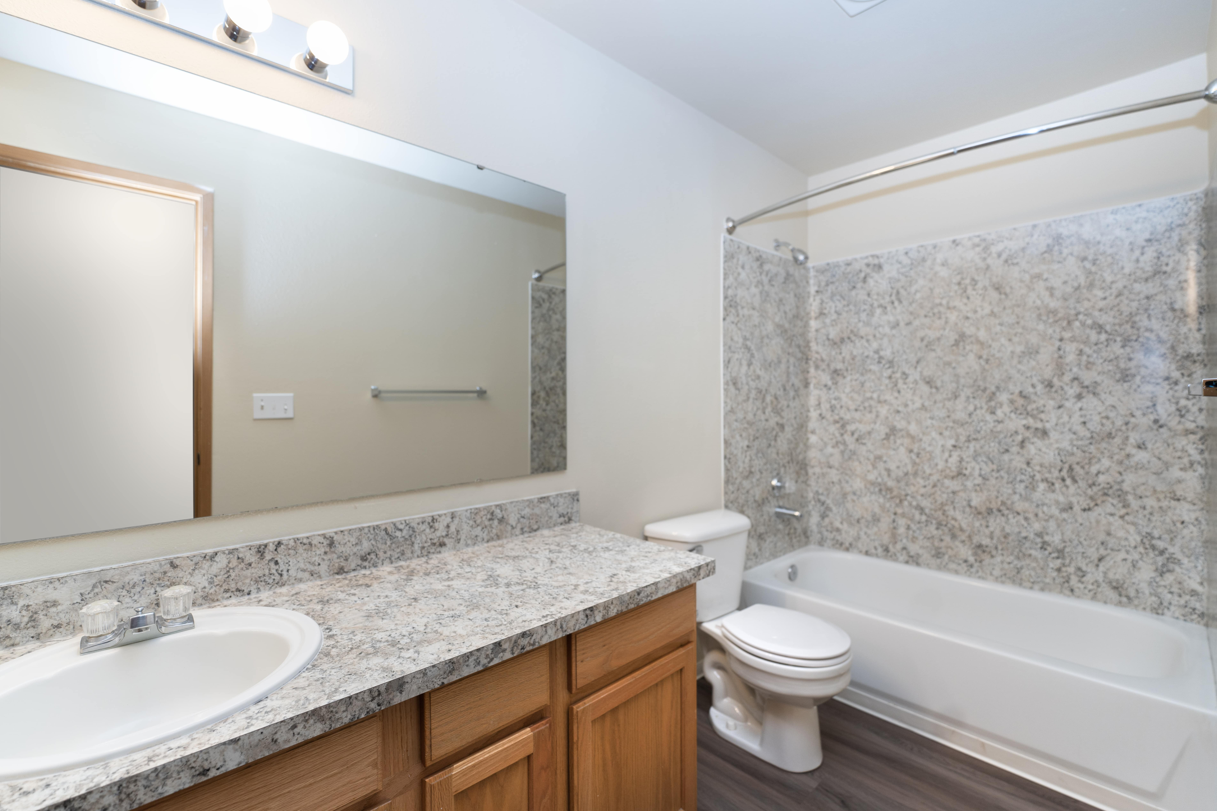1 Bed 1 Bath Standard w/ Den - 822 Sq Ft