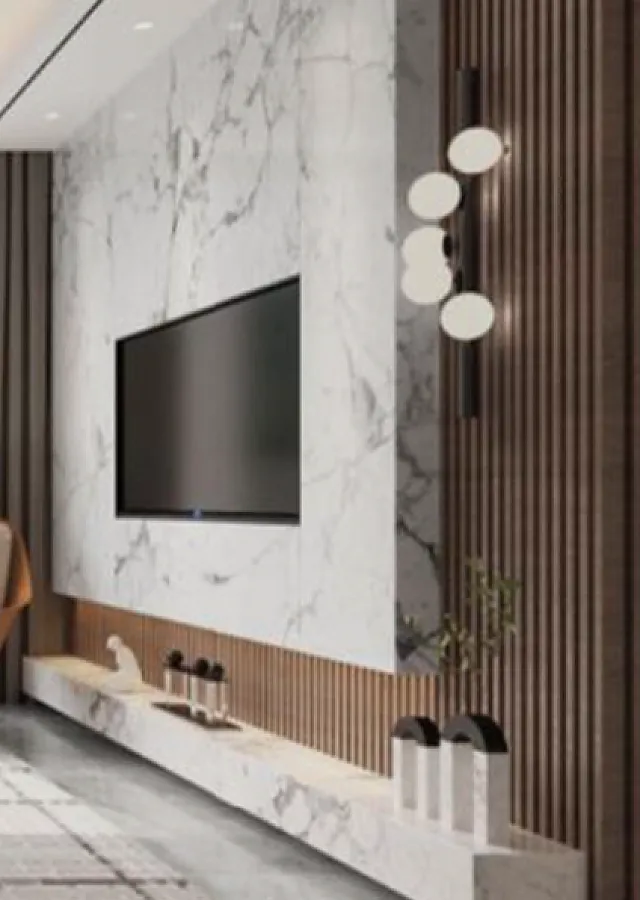 Luxurious living room with elegant marble accent wall, sleek mounted TV, and modern lighting fixtures creating a sophisticated ambiance.