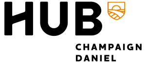 Modern and vibrant logo of UC Merced featuring a stylized orange sun rising over a landscape, set on a sleek black background.