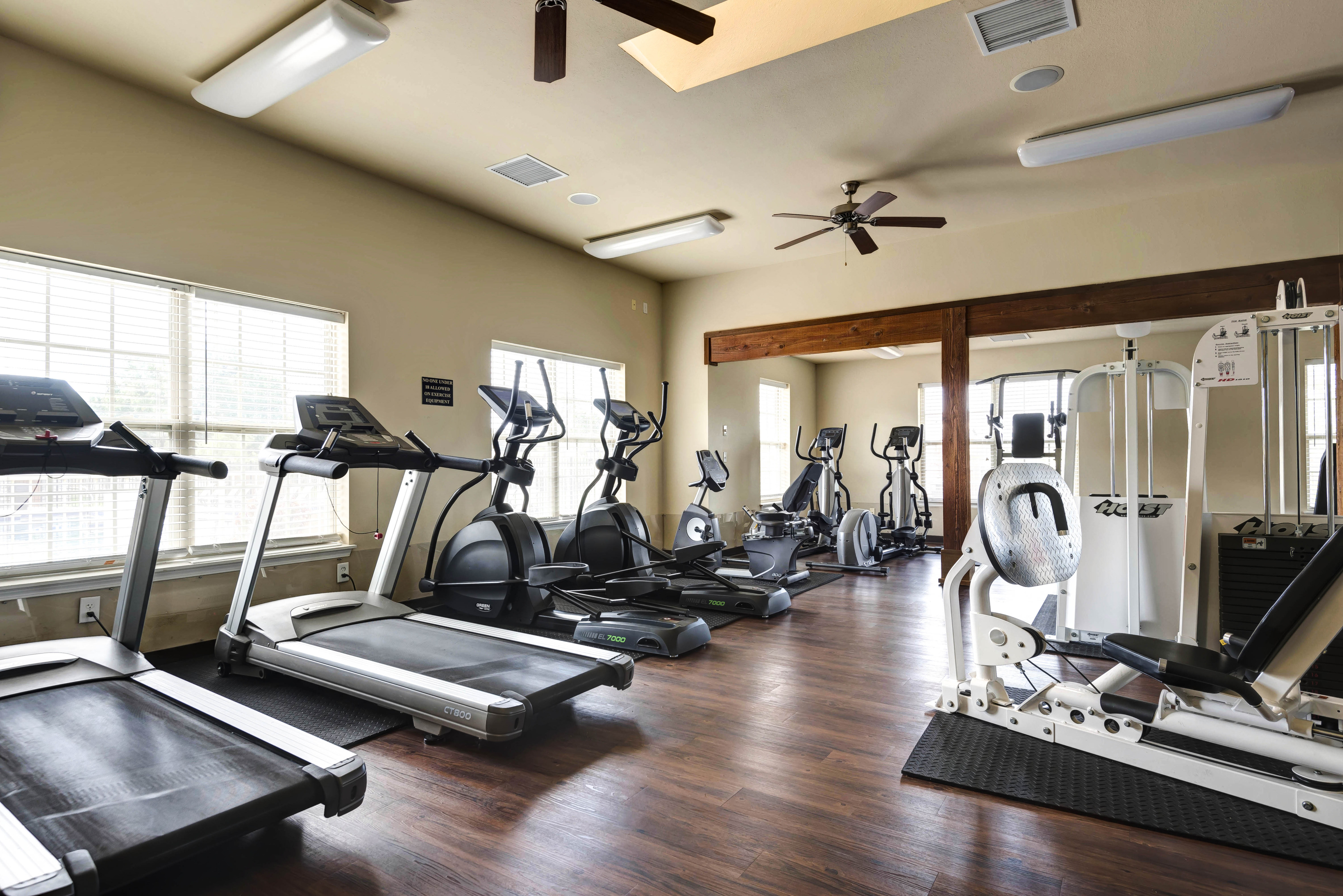 Coryell Courts fitness center with cardio equipment
