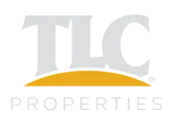 TLC Properties White and Yellow Logo