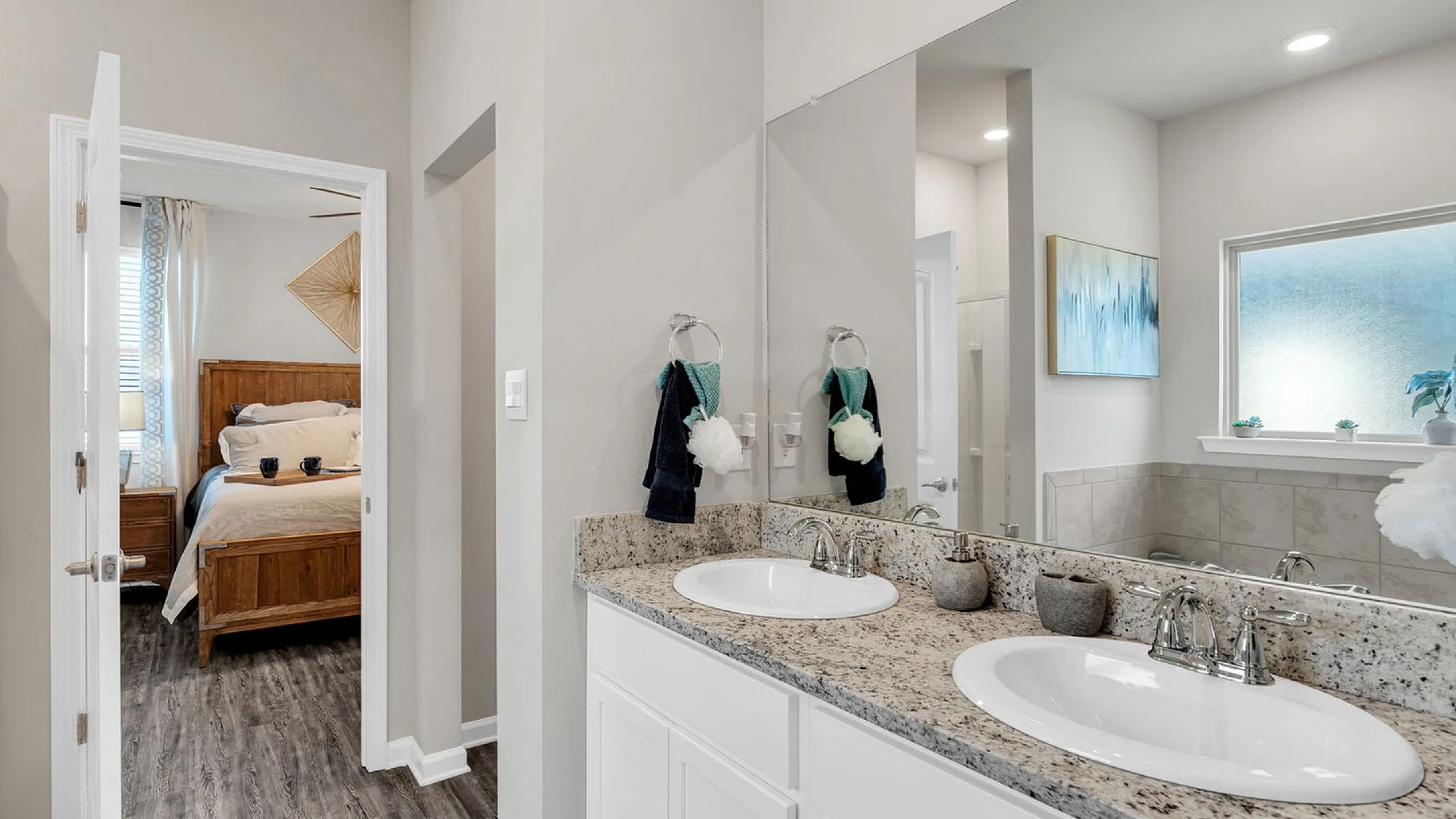 Cullen floorplan, 3 bedroom, primary shared bath with double sinks. bathroom has soaking tub, walk in shower and enormous walk in closet