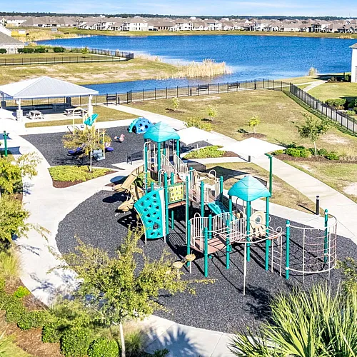 Playground, covered picnic table pavilion area, climbing playground, swings, etc.