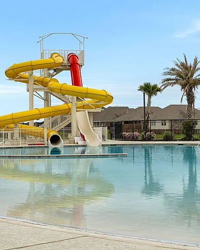 Waterslide, pool, splashpad at clubhouse. Summer fun