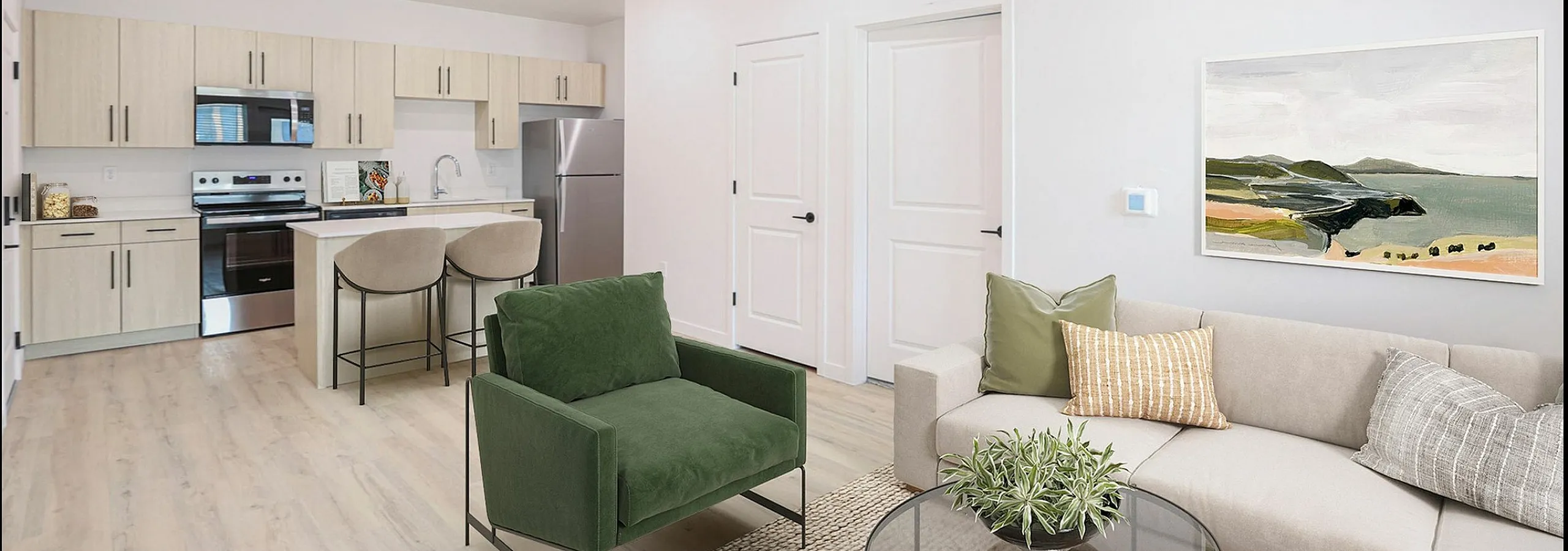 Modern open-concept living area with sleek kitchen, stylish seating, and contemporary decor.