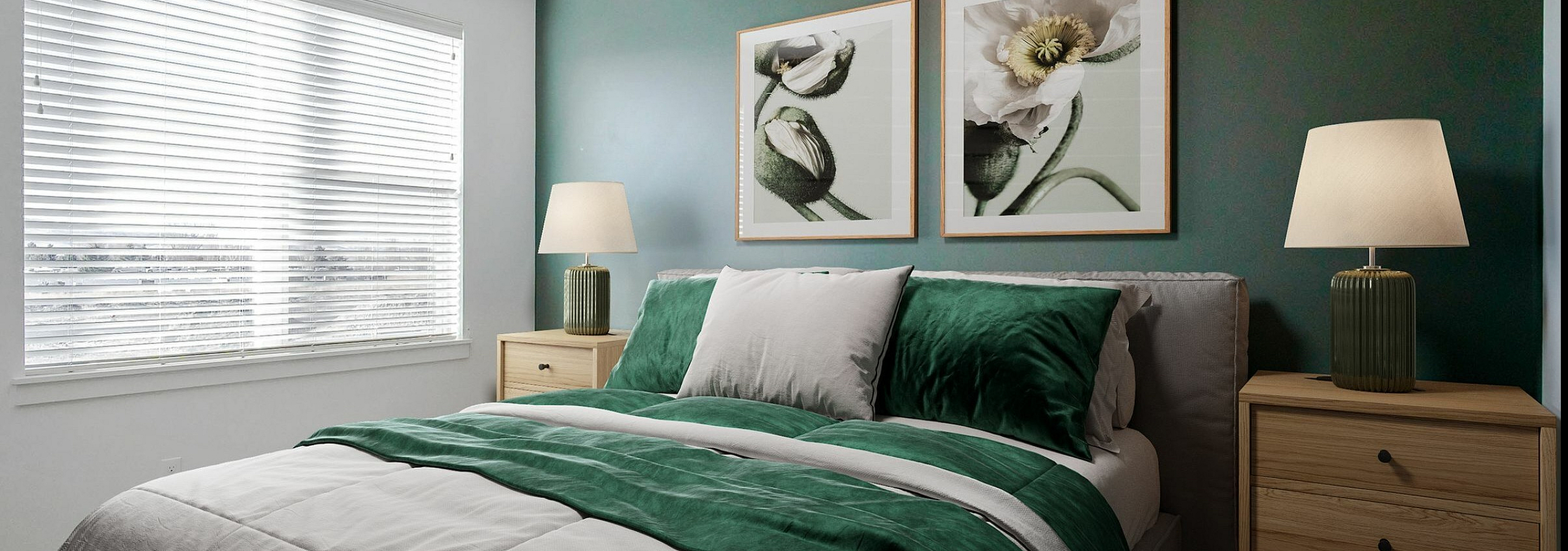 Inviting bedroom with elegant green accent wall, cozy bed, and stylish artwork, flooded with natural light from large window.