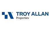 Logo of Troy Allan Properties featuring a modern blue geometric design and text.