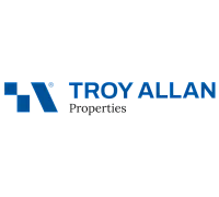 Modern logo design for Troy Allan Properties, featuring bold blue lettering and a sleek geometric symbol.