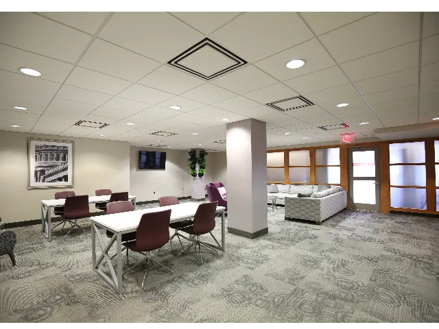 Community Room with Gathering Tables and Sofa