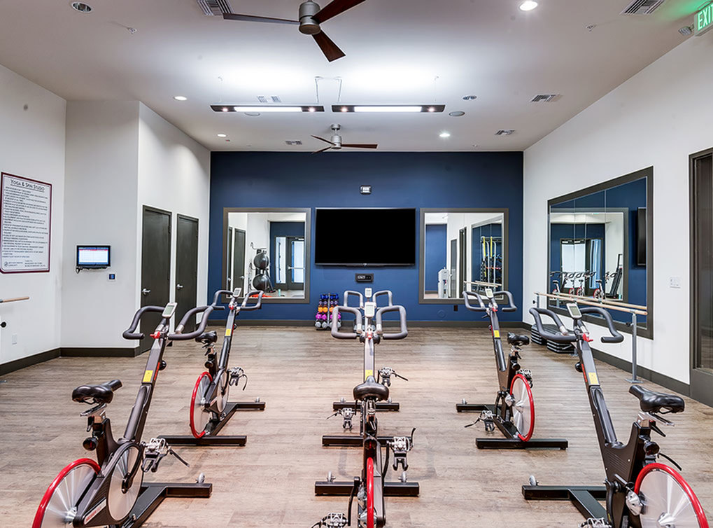 Yoga room & spin studio with fitness classes on demand