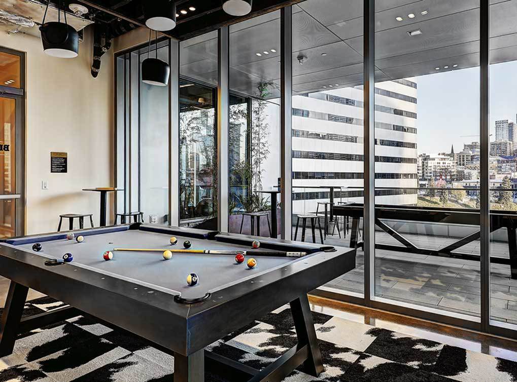 Clubroom with full kitchen, billiards and covered outdoor patio.