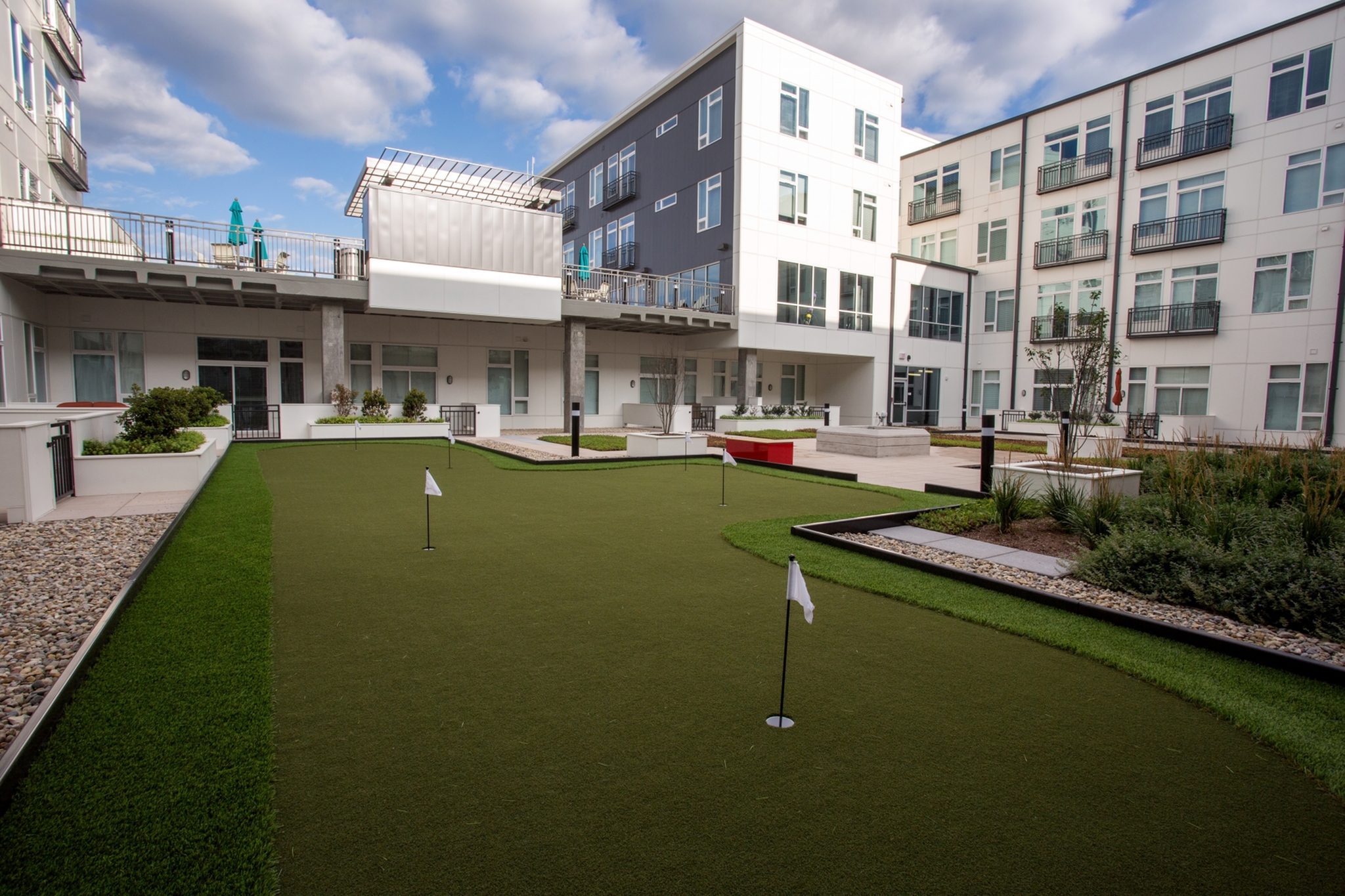 Image of Active Courtyard featuring a Bocce Court and Putting Green for Artistry Indy