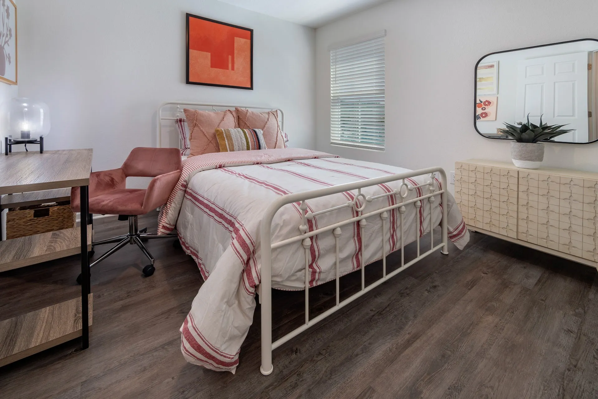 Furnished bedroom with bed, desk and one window