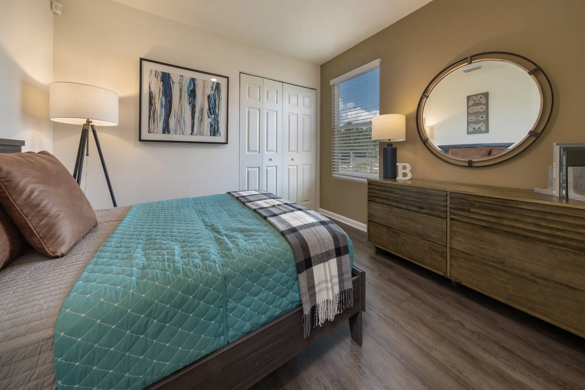 Furnished bedroom with bed anf one window