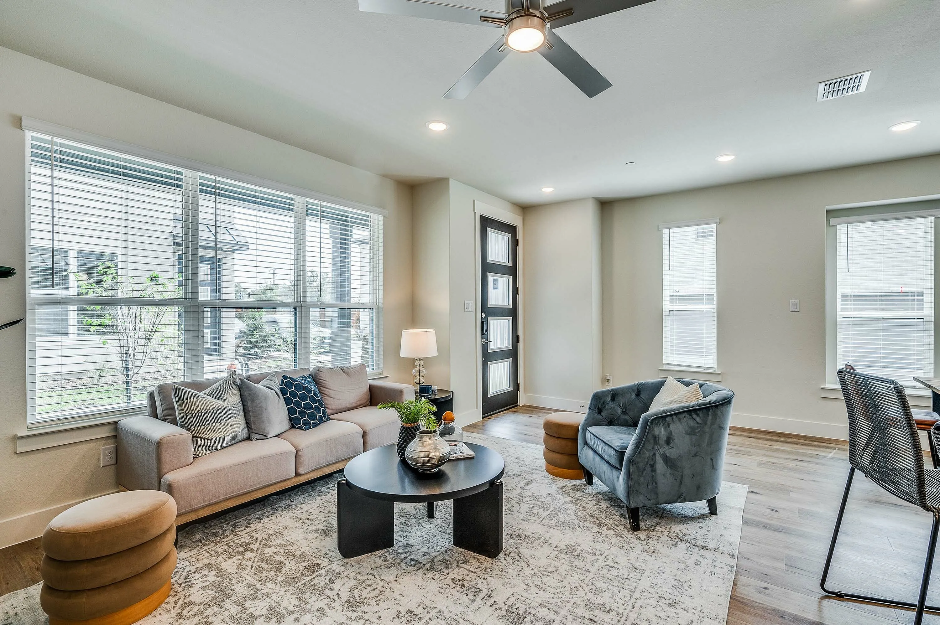 Furnished living room with smart door lock