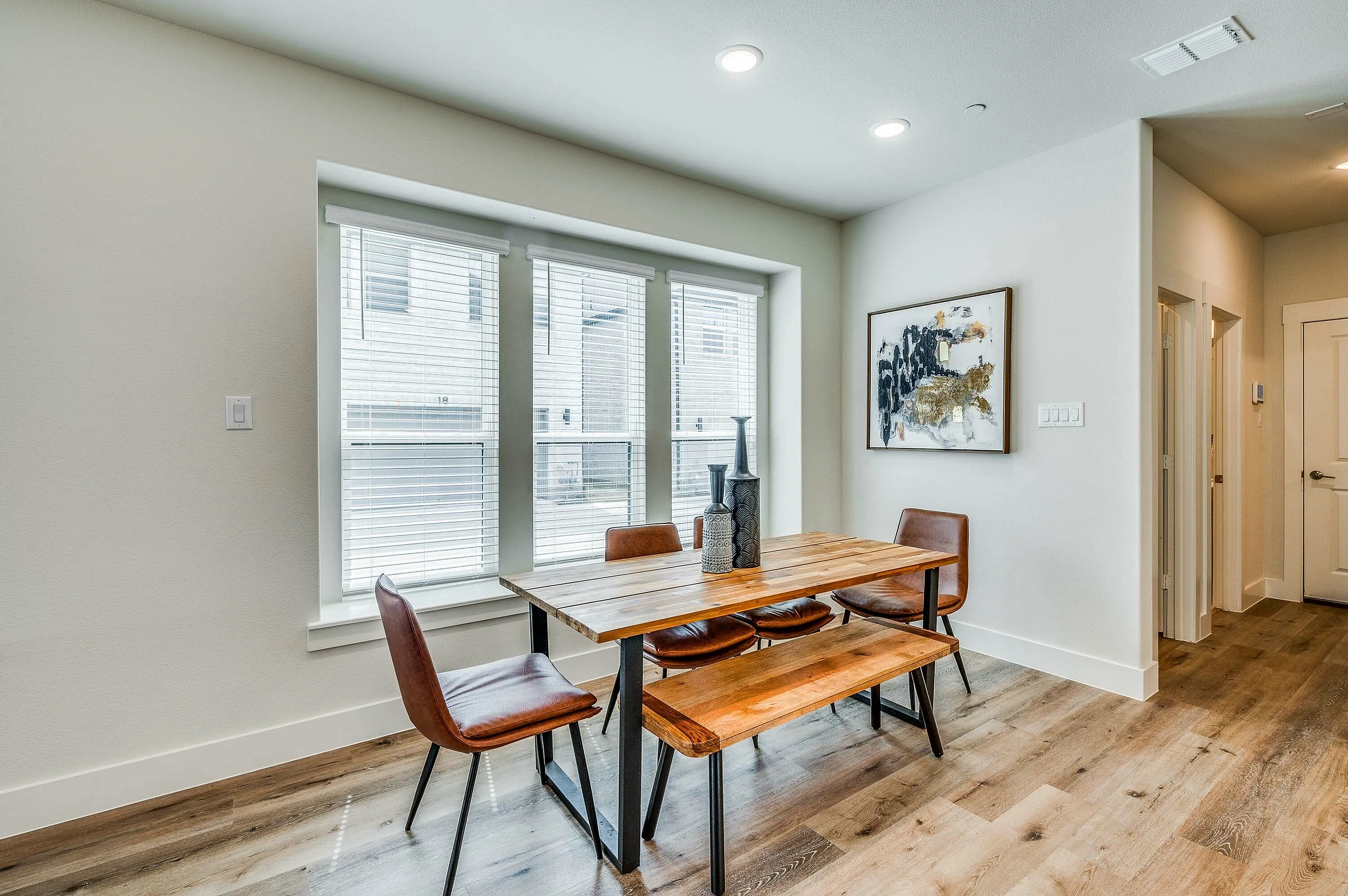 Furnished dining room with table and chairs