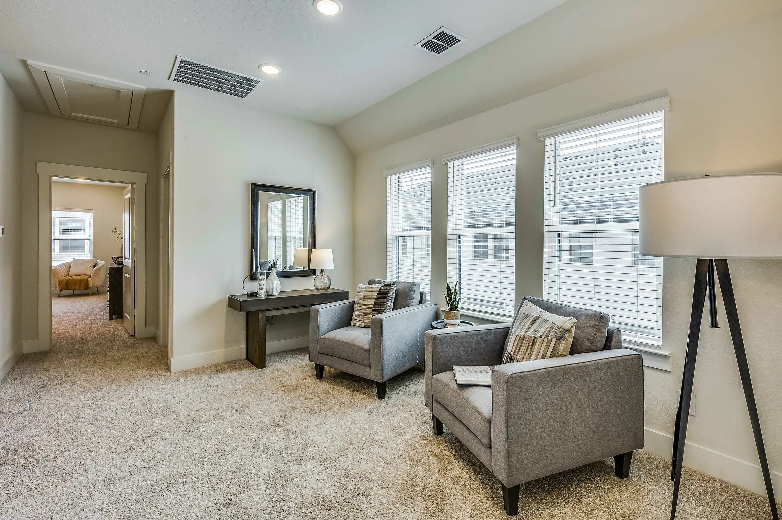 Furnished living space with chairs and table