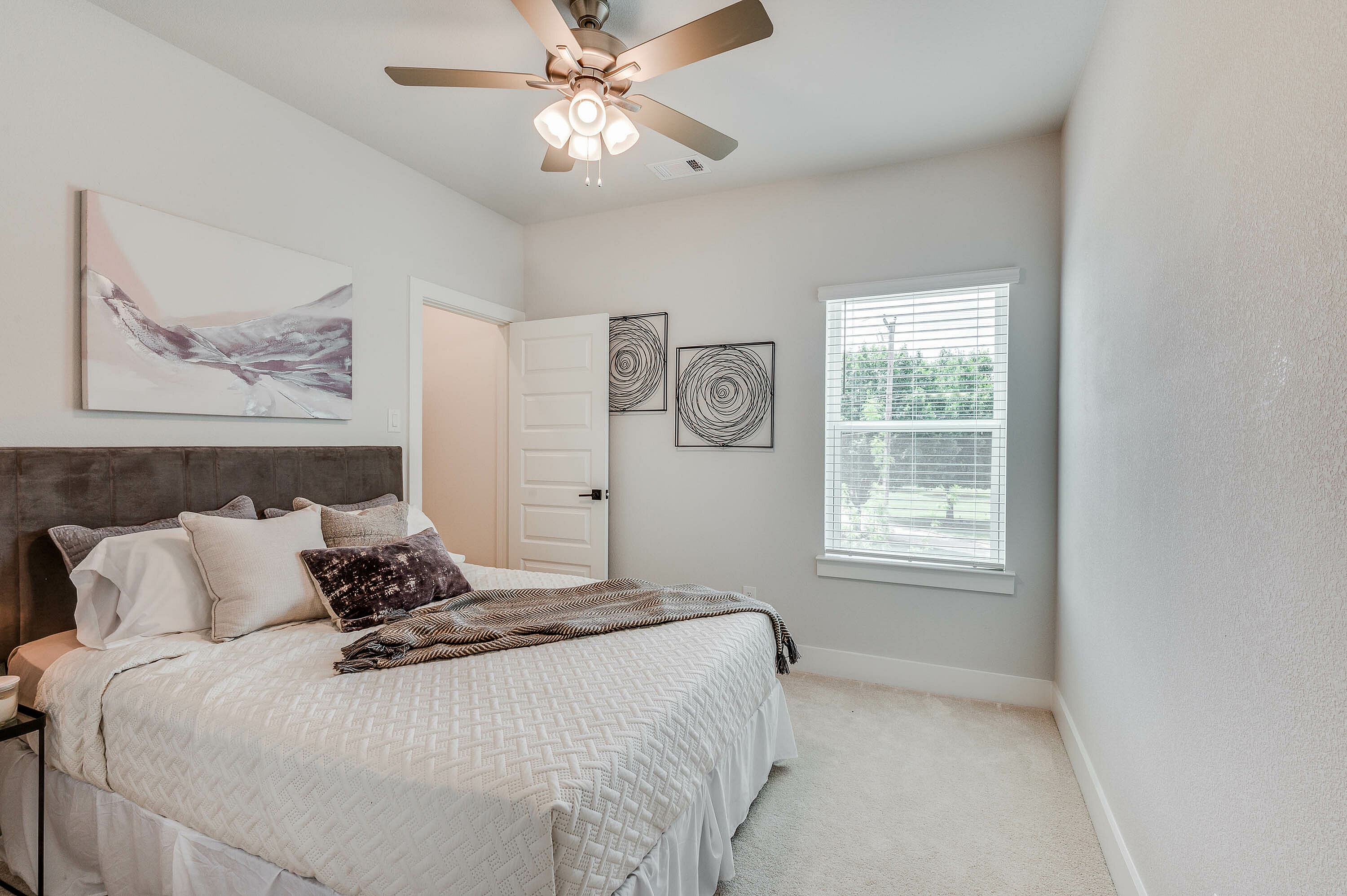 furnished and decorated living room and kitchen with wood style flooring
