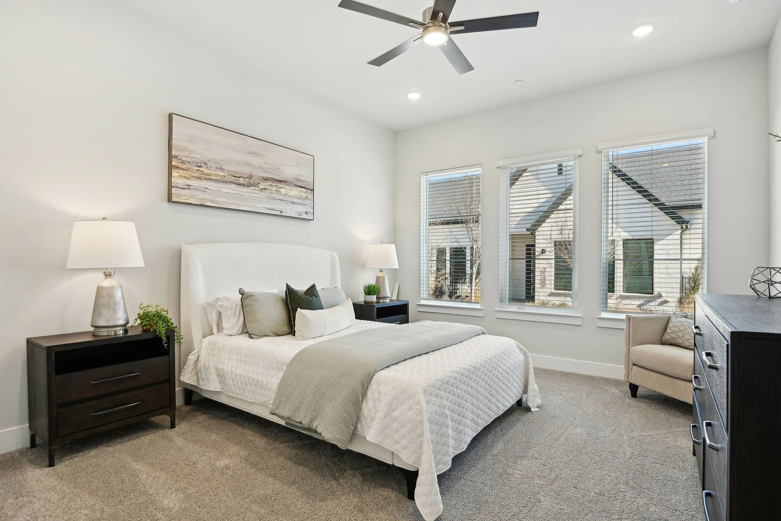 main bedroom with oversized windows
