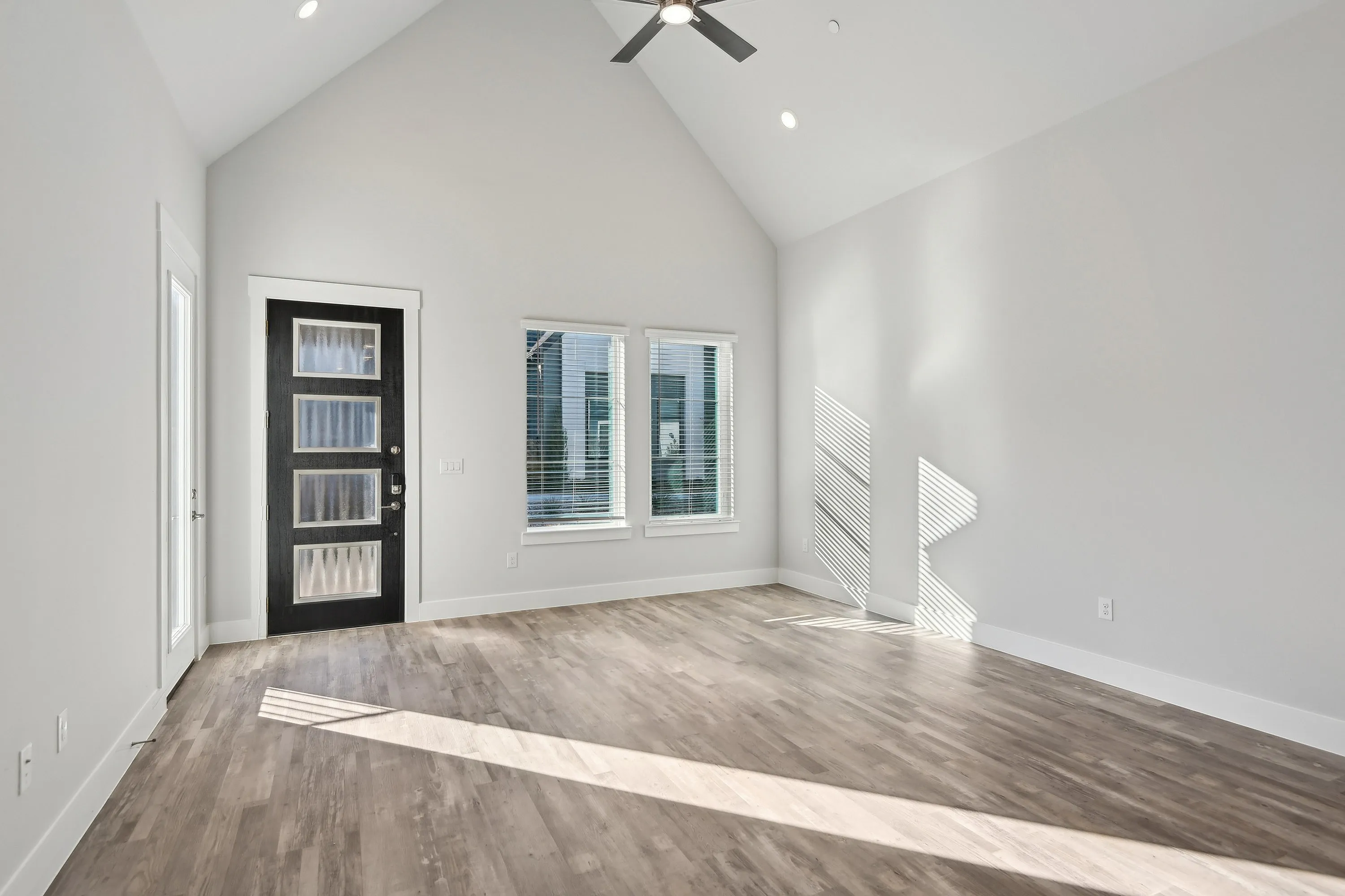 living area with cathedral ceilings