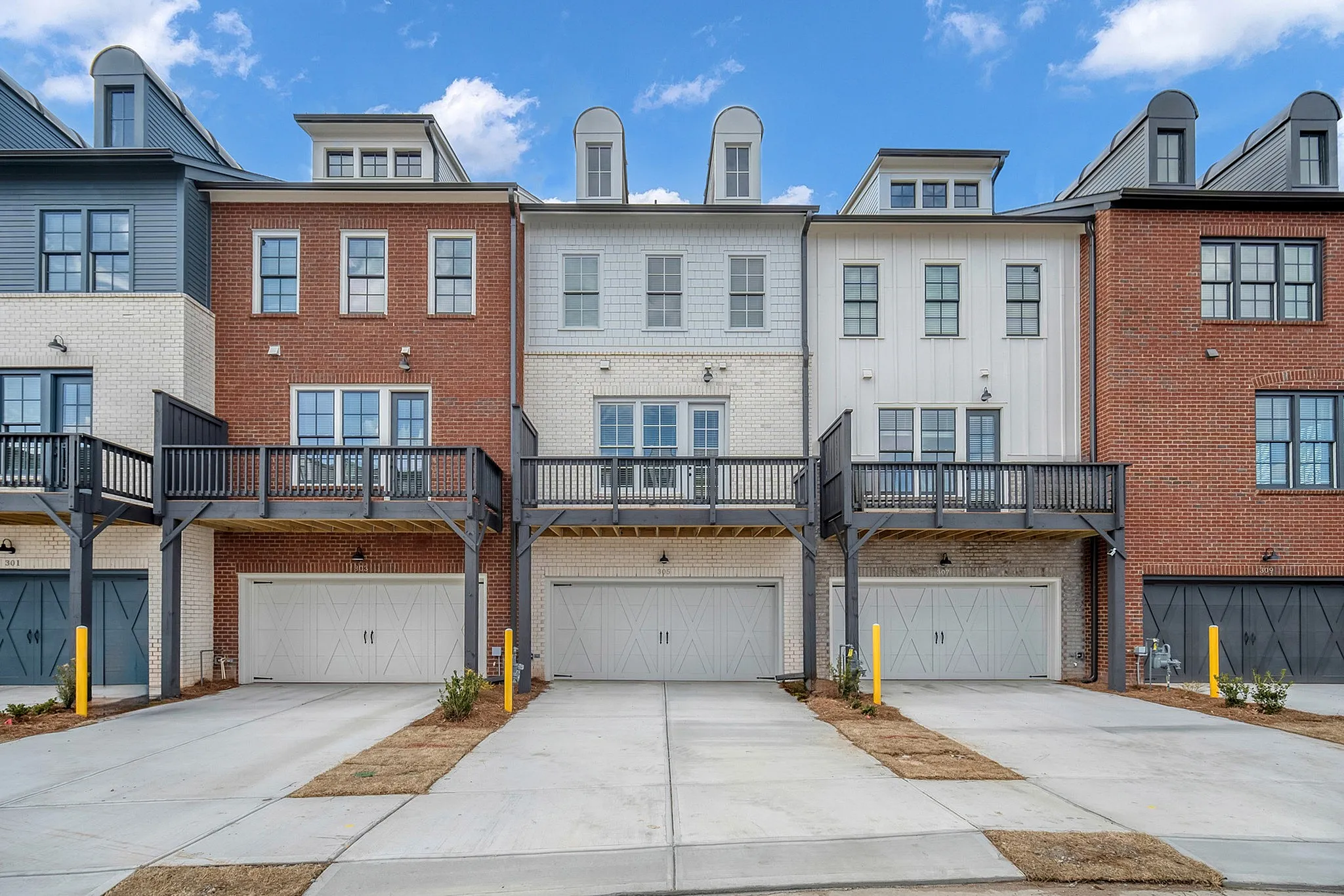 Exterior of townhome with garage