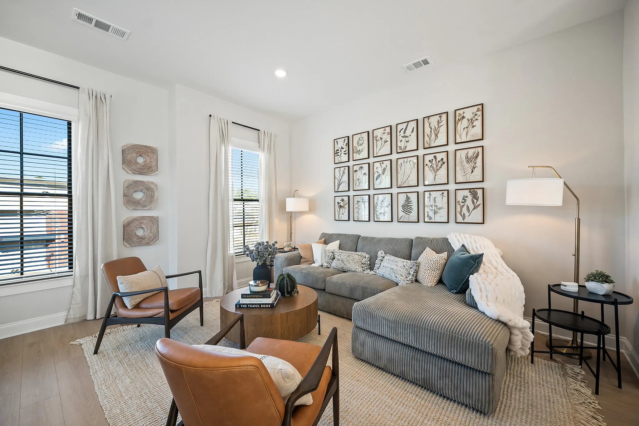 Furnished living room with couch and 2 chairs
