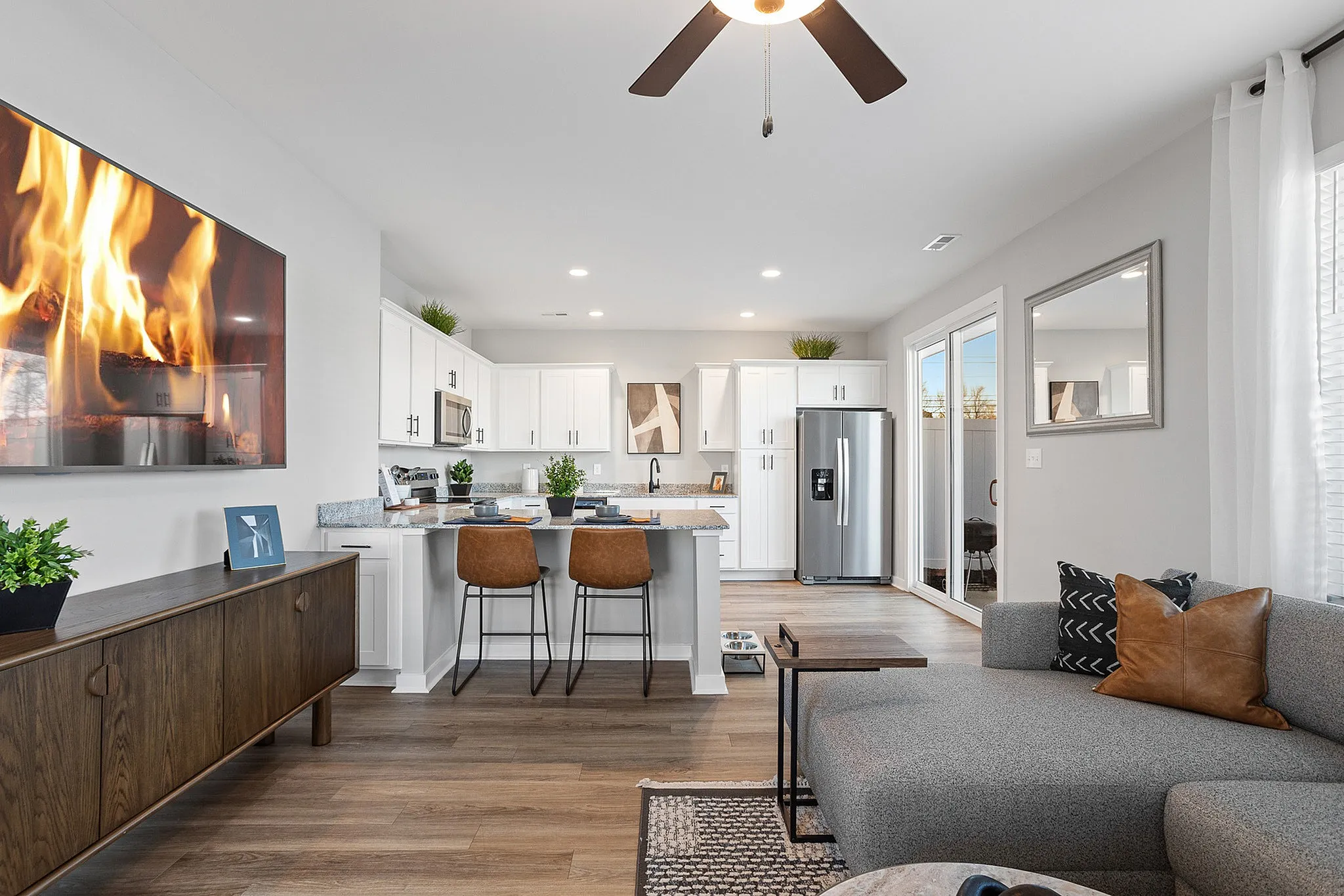 Furnished living room and kitchen