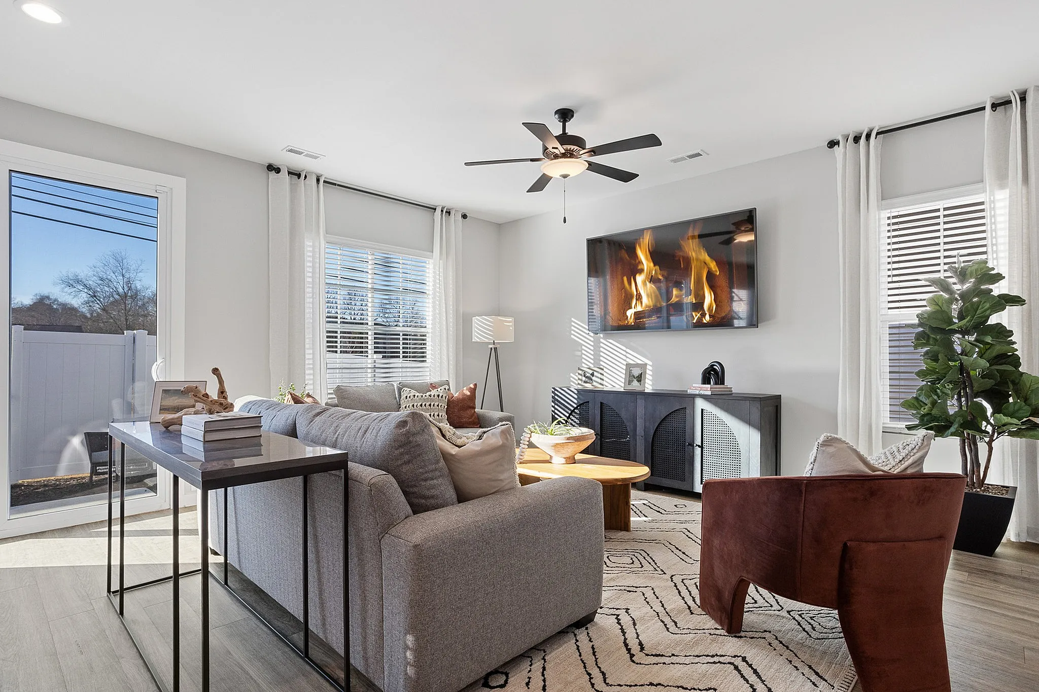 Furnished living room with couches and chairs
