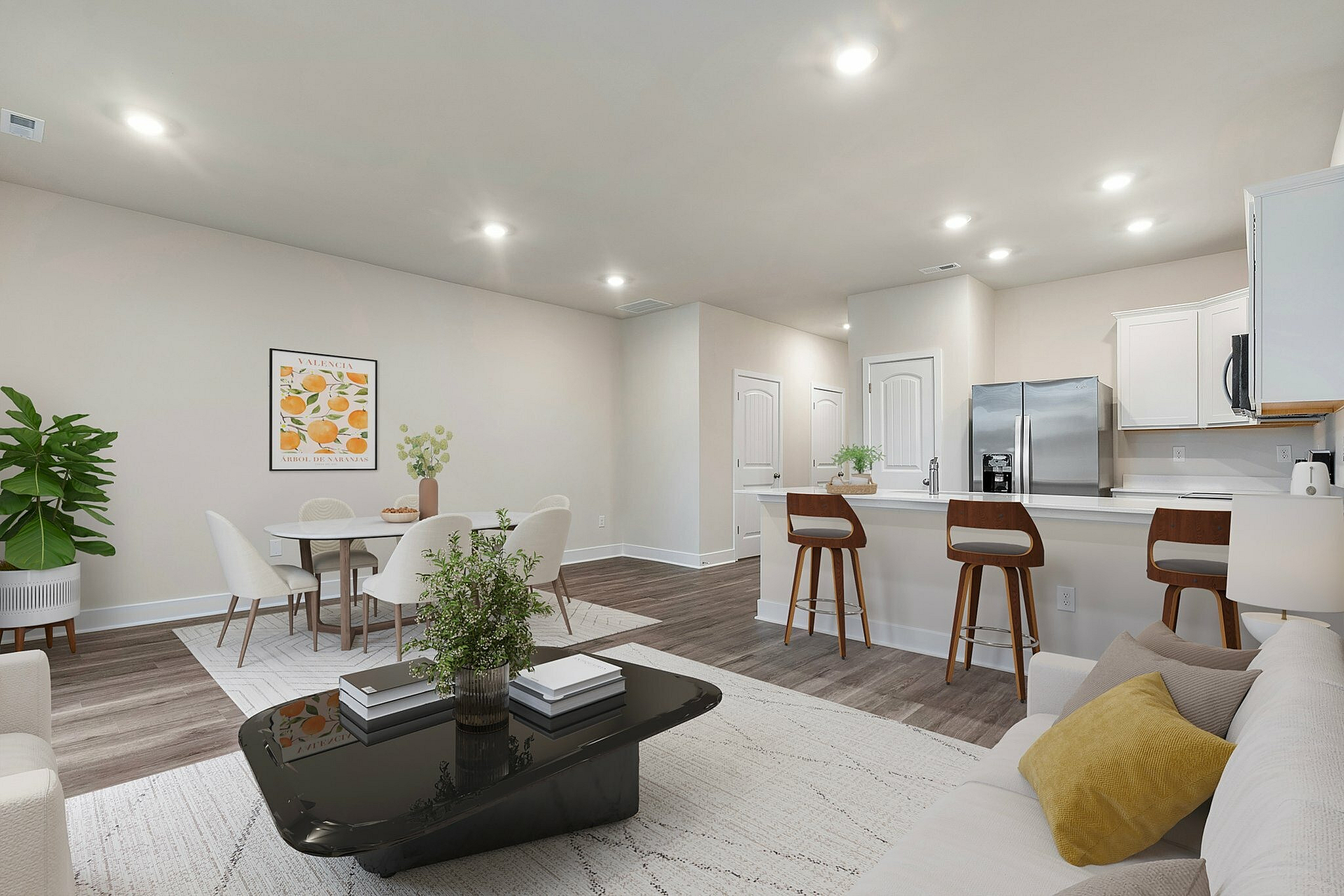 Virtually staged dining room and living room
