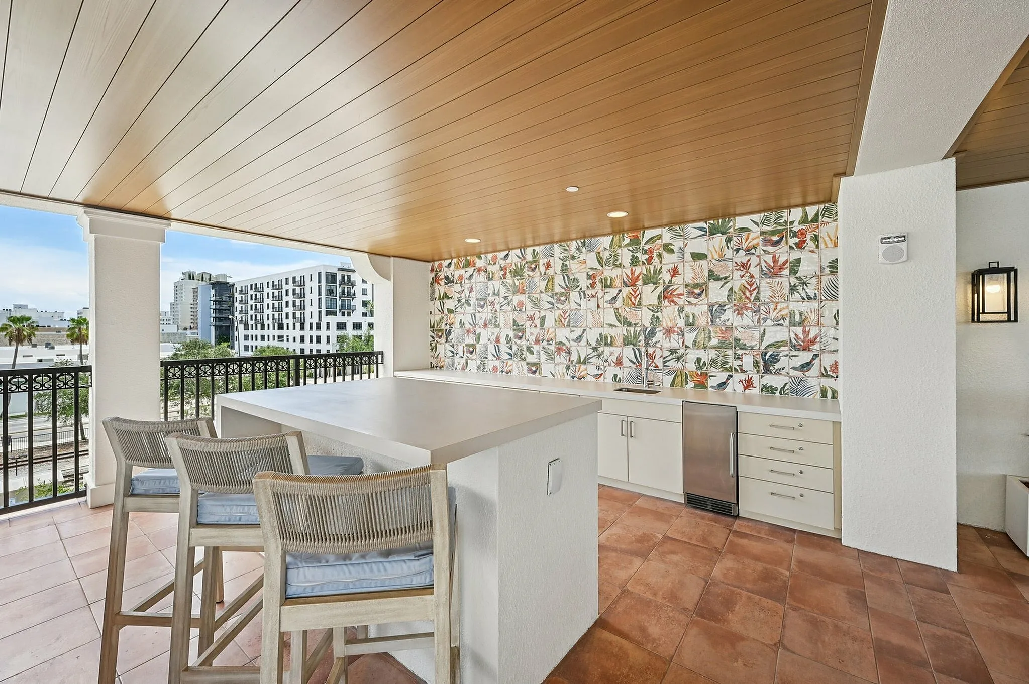 Outdoor kitchen area with large island