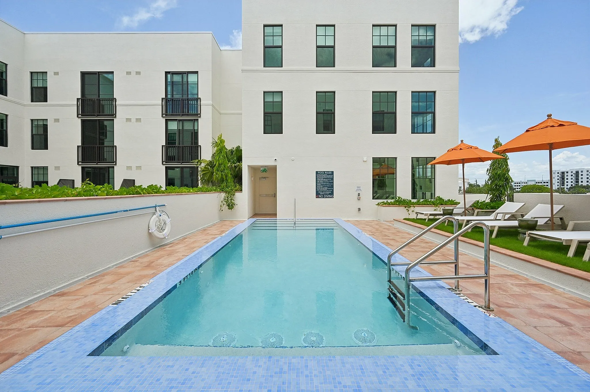 Pool with lounge chairs