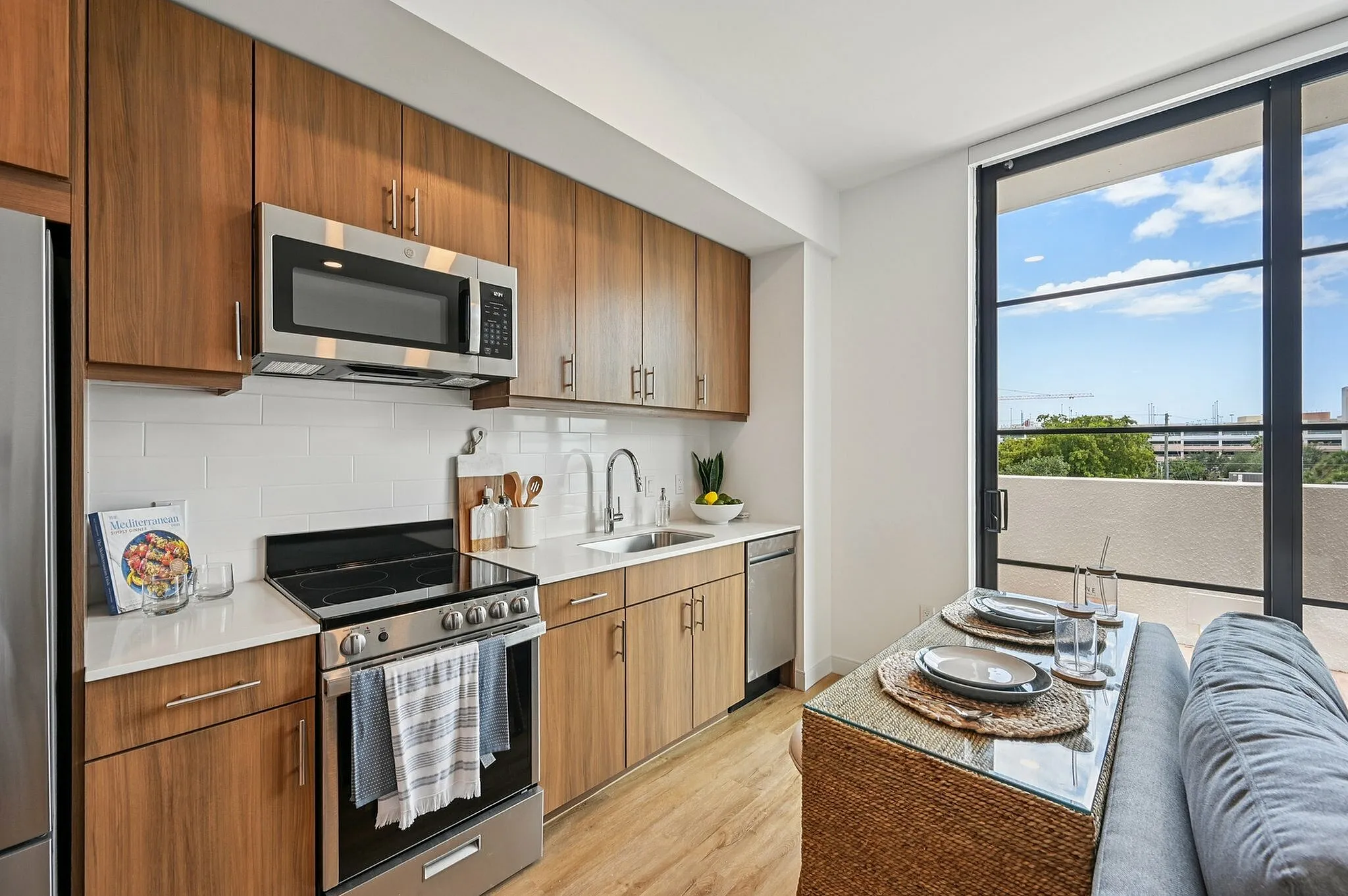 Studio kitchen with wood cabinets