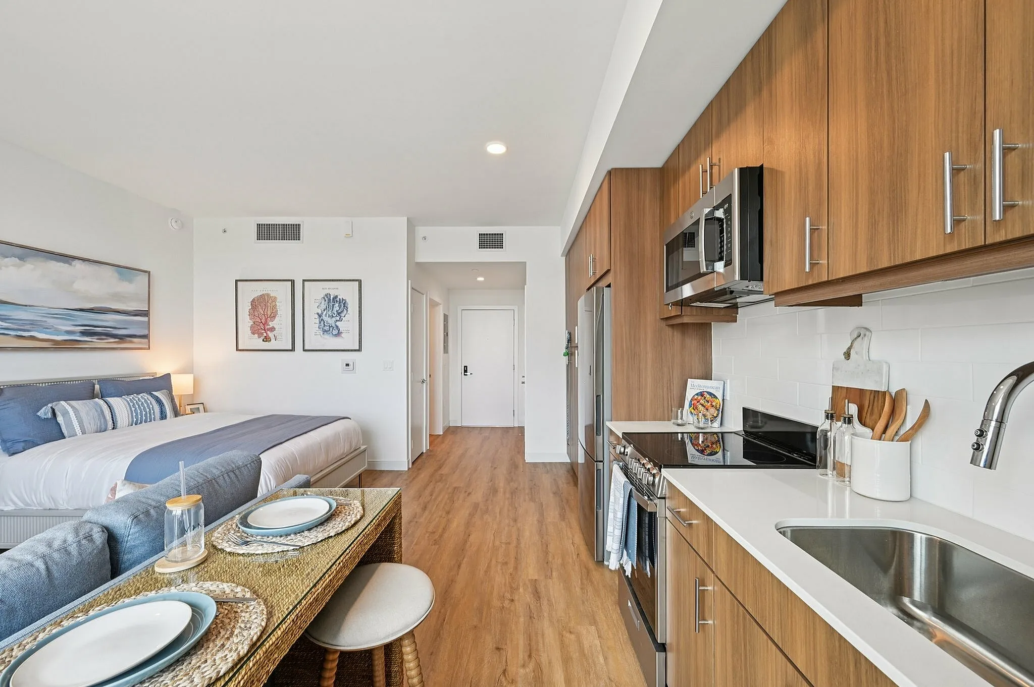 Studio kitchen with wood cabinets
