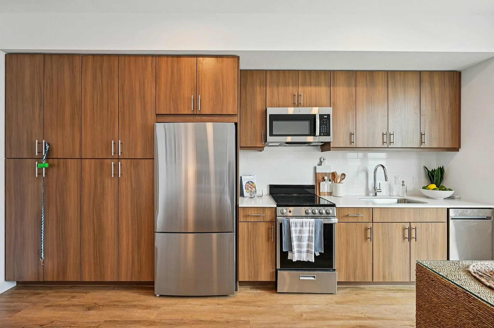Studio kitchen with wood cabinets