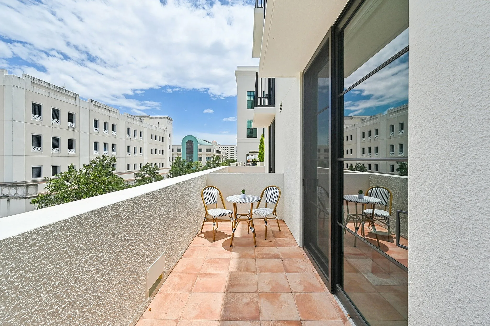 Balcony with table and chairs