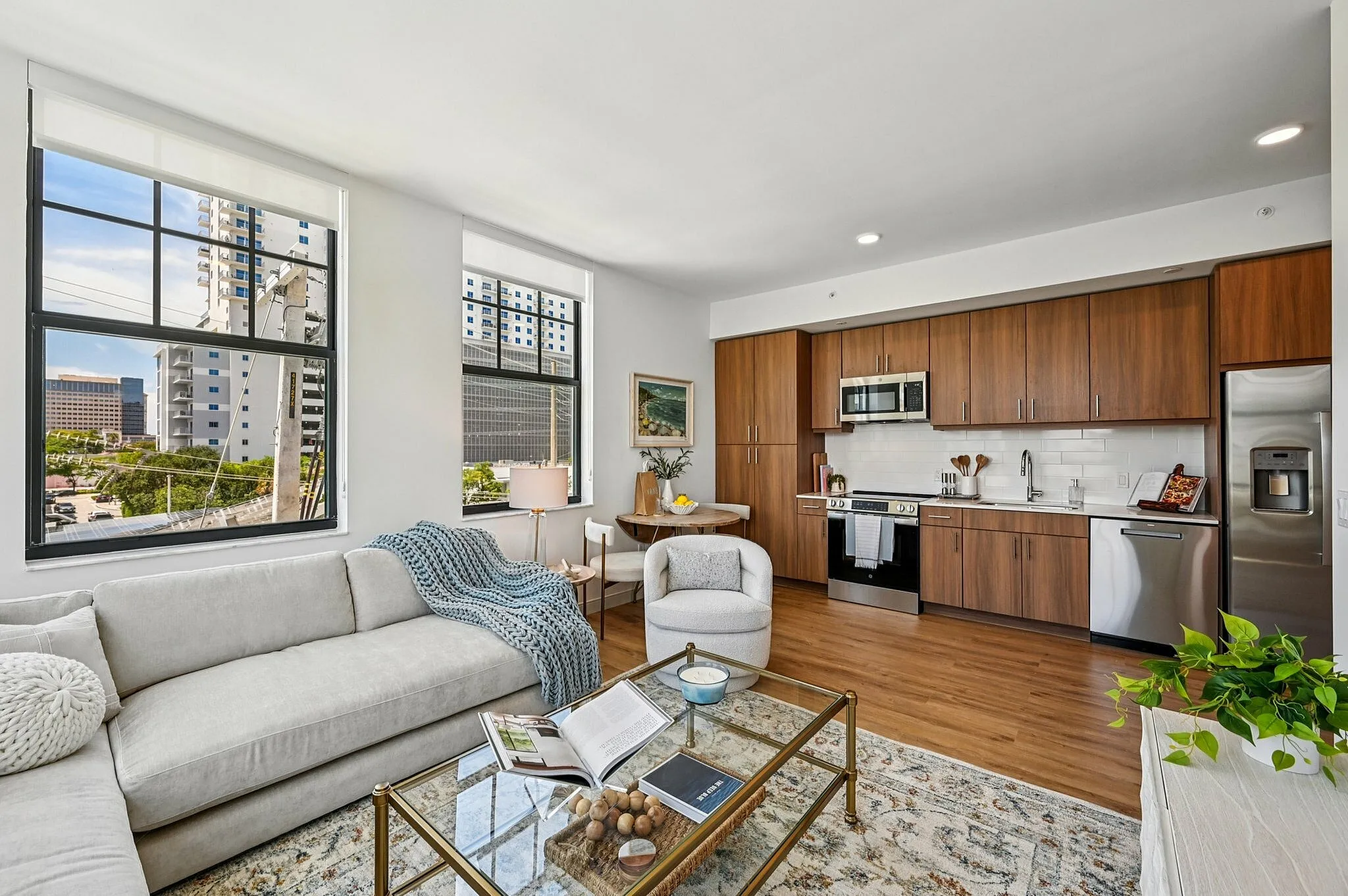 Living room and kitchen with small dining area