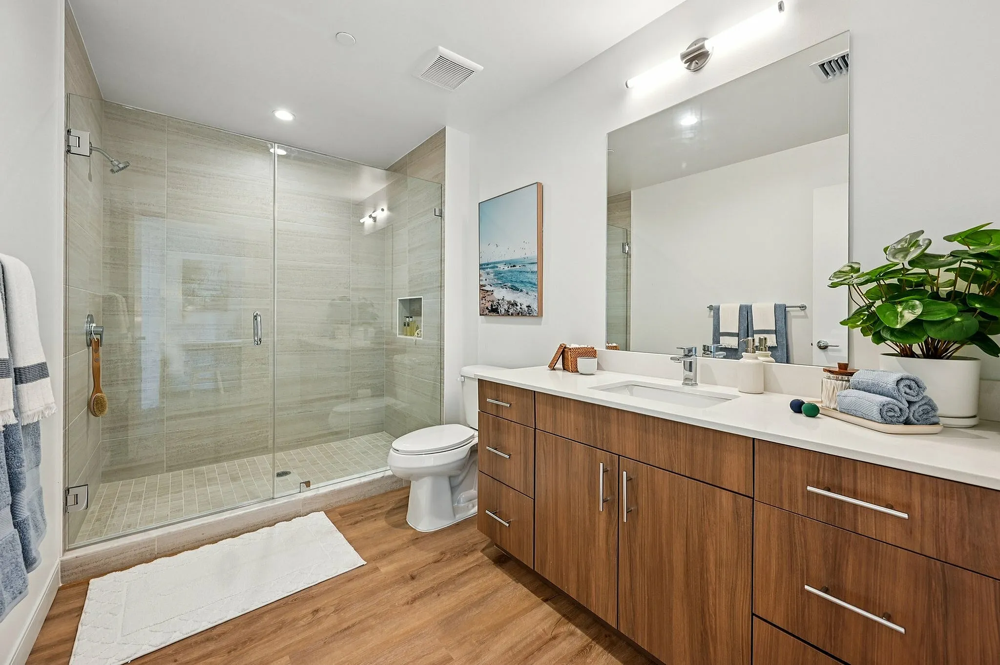 Bathroom with walk in shower and large vanity